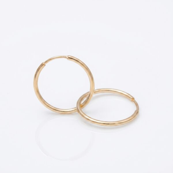 Candongas lisas 0.55gr / Largo 1.2cm / Oro Amarillo 18k