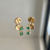 1 Topos con 9.5pts de esmeralda 0.4gr / Largo 0.24cm Oro Amarillo