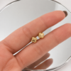 ChatGPT Image 9 jun 2026, 12_23_41 Topos Trebol Diamantado Oro amarillo 18k 0,55 Gr / 5,1 mm