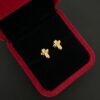 Fondo_negro_y_el_borde_202606051505 Topos cruz en medio relieve Oro amarillo 18k 0,6 Gr / 5,6 mm