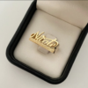 Anillo nombre Nicole (POR FABRICACIÓN) Oro amarillo 18k